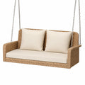 Rattanschaukelsofa mit Creme Kissen und Stahlketten